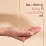 Image showing the thick, rich texture of Fushi organic cold pressed castor oil, used in Castor oil packs & lash care.
