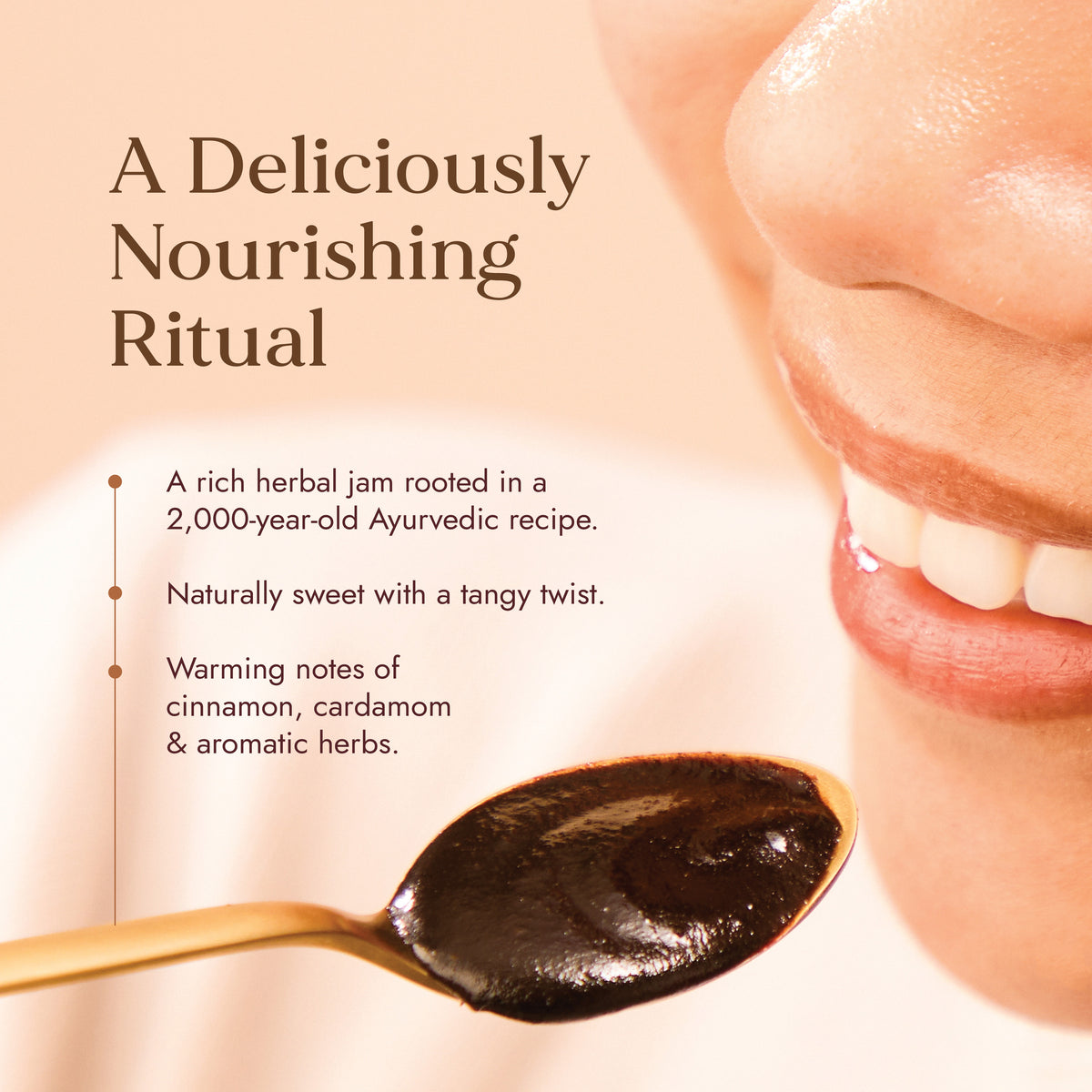  Image of a smiling woman enjoying a spoonful of Fushi Chyawanprash, an Ayurvedic jam that’s naturally sweet with notes of cinnamon, cardamom & aromatic herbs.